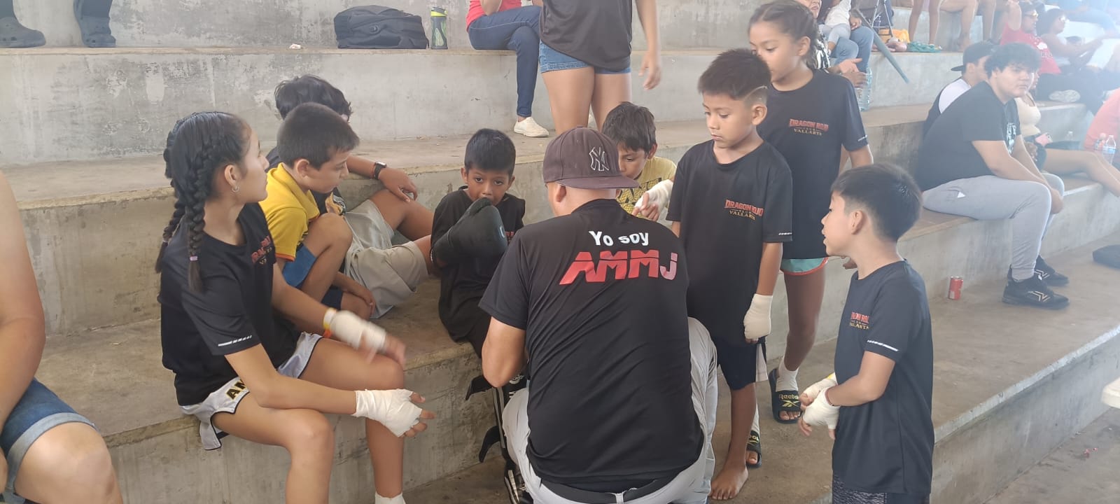 Martial arts students and instructor gathered together