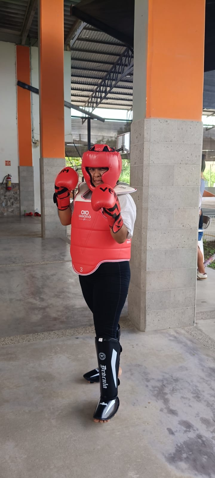 Martial arts participant wearing protective gear